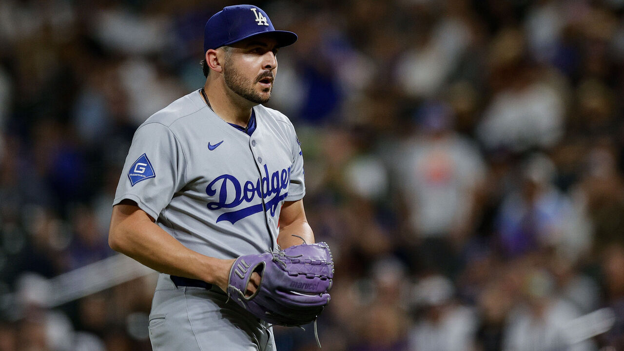 DENVER, CO - JUNE 25: Alex Vesia #51 of the Los Angeles Dodgers reacts during the game between the Los Angeles Dodgers and the Colorado Rockies at Coors Field on Wednesday, June 25, 2025 in Denver, Colorado.