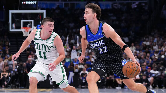 ORLANDO, FLORIDA - NOVEMBER 07: Franz Wagner #22 of the Orlando Magic dribbles the ball against Payton Pritchard #11 of the Boston Celtics during the fourth quarter of the NBA Cup game at Kia Center on November 07, 2025 in Orlando, Florida. NOTE TO USER: User expressly acknowledges and agrees that, by downloading and/or using this photograph, user is consenting to the terms and conditions of the Getty Images License Agreement.