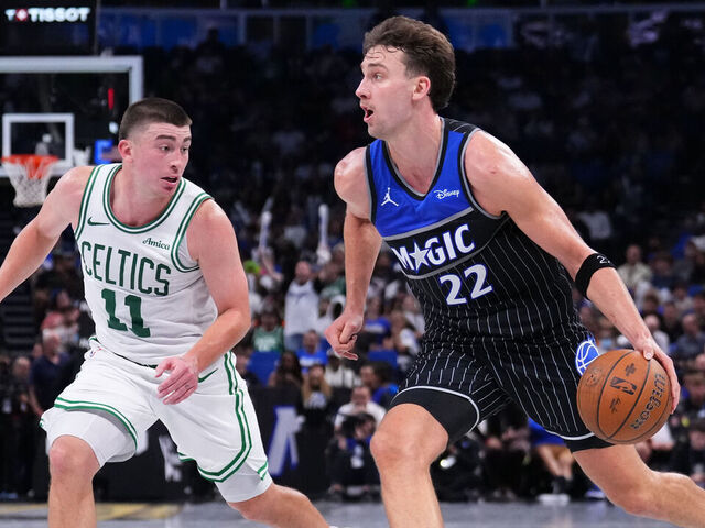 ORLANDO, FLORIDA - NOVEMBER 07: Franz Wagner #22 of the Orlando Magic dribbles the ball against Payton Pritchard #11 of the Boston Celtics during the fourth quarter of the NBA Cup game at Kia Center on November 07, 2025 in Orlando, Florida. NOTE TO USER: User expressly acknowledges and agrees that, by downloading and/or using this photograph, user is consenting to the terms and conditions of the Getty Images License Agreement.