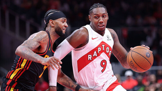 ATLANTA, GEORGIA - NOVEMBER 07: RJ Barrett #9 of the Toronto Raptors drives against Nickeil Alexander-Walker #7 of the Atlanta Hawks during the fourth quarter of the Emirates NBA Cup game at State Farm Arena on November 07, 2025 in Atlanta, Georgia.
