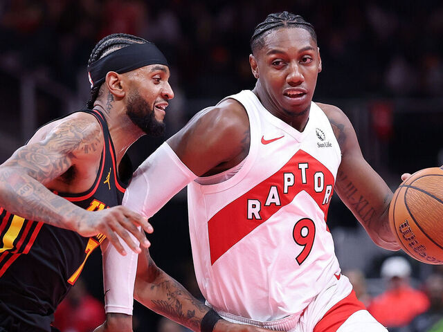 ATLANTA, GEORGIA - NOVEMBER 07: RJ Barrett #9 of the Toronto Raptors drives against Nickeil Alexander-Walker #7 of the Atlanta Hawks during the fourth quarter of the Emirates NBA Cup game at State Farm Arena on November 07, 2025 in Atlanta, Georgia.