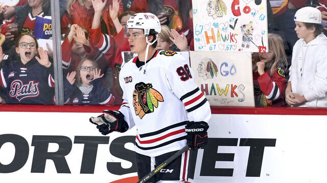 CALGARY, CANADA - NOVEMBER 07: Connor Bedard #98 of the Chicago Blackhawks skates past fans in the stands during warmups before the game against the Calgary Flames at the Scotiabank Saddledome on November 7, 2025, in Calgary, Alberta, Canada.
