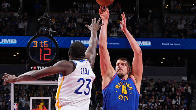 DENVER, CO - NOVEMBER 7: Nikola Jokic #15 of the Denver Nuggets shoots a three point basket against the Golden State Warriors during the 2025-26 Emirates Cup on November 7, 2025 at Ball Arena in Denver, Colorado. NOTE TO USER: User expressly acknowledges and agrees that, by downloading and/or using this Photograph, user is consenting to the terms and conditions of the Getty Images License Agreement. Mandatory Copyright Notice: Copyright 2025 NBAE