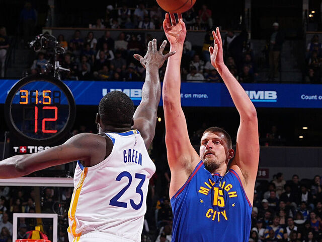 DENVER, CO - NOVEMBER 7: Nikola Jokic #15 of the Denver Nuggets shoots a three point basket against the Golden State Warriors during the 2025-26 Emirates Cup on November 7, 2025 at Ball Arena in Denver, Colorado. NOTE TO USER: User expressly acknowledges and agrees that, by downloading and/or using this Photograph, user is consenting to the terms and conditions of the Getty Images License Agreement. Mandatory Copyright Notice: Copyright 2025 NBAE