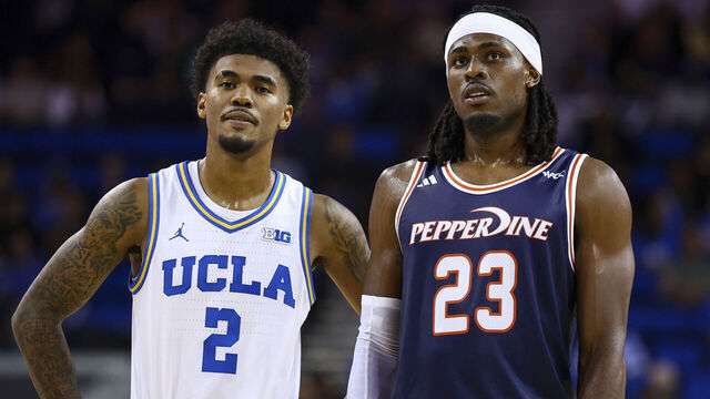 LOS ANGELES, CALIFORNIA - NOVEMBER 07: Donovan Dent #2 of the UCLA Bruins and Javon Cooley #23 of the Pepperdine Waves interact in the second half at UCLA Pauley Pavilion on November 07, 2025 in Los Angeles, California.