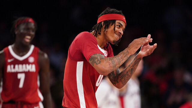 NEW YORK, NEW YORK - NOVEMBER 08: Labaron Philon Jr. #0 of the Alabama Crimson Tide gestures to the crowd in the second half during the game against the St. John's Red Storm at Madison Square Garden on November 08, 2025 in New York City.