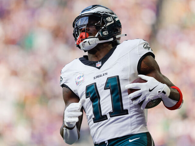 MINNEAPOLIS, MN - OCTOBER 19: Philadelphia Eagles wide receiver A.J. Brown (11) scores a touchdown during the first half of the NFL game between the Minnesota Vikings and Philadelphia Eagles on October 19th, 2025, at U.S. Bank Stadium in Minneapolis, MN.