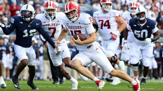 STATE COLLEGE, PENNSYLVANIA - NOVEMBER 8: Fernando Mendoza #15 of the Indiana Hoosiers runs the ball to score a touchdown during the first quarter against the Penn State Nittany Lions at Beaver Stadium on November 8, 2025 in State College, Pennsylvania.