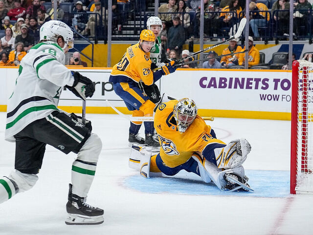 NASHVILLE, TENNESSEE - NOVEMBER 8: Sam Steel #18 of the Dallas Stars scores a goal against Justus Annunen #29 of the Nashville Predators during an NHL game at Bridgestone Arena on November 8, 2025 in Nashville, Tennessee.