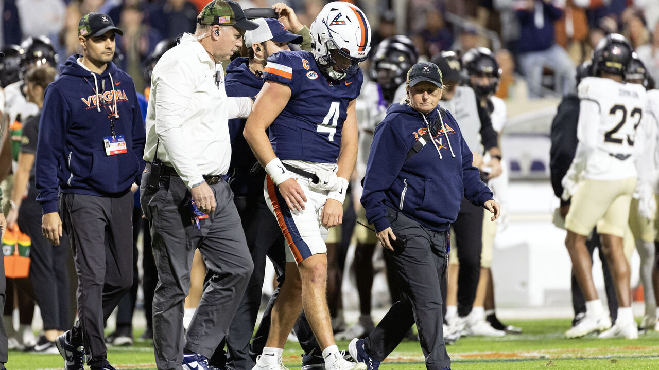 CHARLOTTESVILLE, VIRGINIA - NOVEMBER 8: Chandler Morris #4 of the Virginia Cavaliers walks off the field after being injured in the first half during a game against the Wake Forest Demon Deacons at Scott Stadium on November 8, 2025 in Charlottesville, Virginia.
