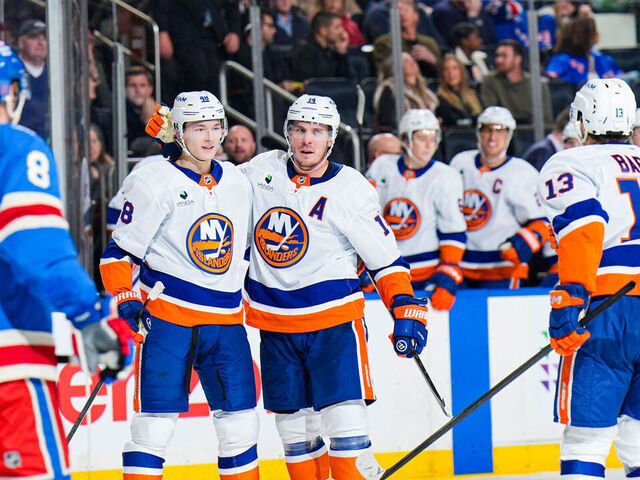 NEW YORK, NEW YORK - NOVEMBER 08: Bo Horvat #14 of the New York Islanders celebrates with teammates after scoring a goal in the second period against the New York Rangers at Madison Square Garden on November 8, 2025 in New York City.