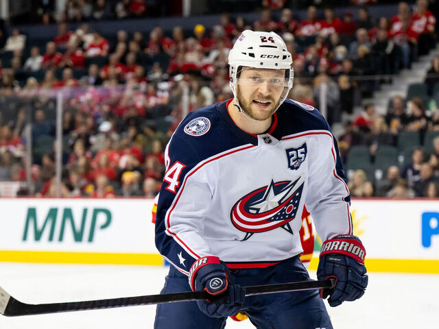 CALGARY, CANADA - NOVEMBER 5: Mathieu Olivier #24 of the Columbus Blue Jackets in action against the Calgary Flames during the third period at the Scotiabank Saddledome on November 5, 2025 in Calgary, Alberta, Canada.