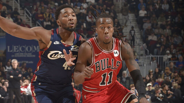 CLEVELAND, OH - NOVEMBER 8: Ayo Dosunmu #11 of the Chicago Bulls drives to the basket as Donovan Mitchell #45 of the Cleveland Cavaliers plays defense during the game on November 8, 2025 at Rocket Arena in Cleveland, Ohio. NOTE TO USER: User expressly acknowledges and agrees that, by downloading and/or using this Photograph, user is consenting to the terms and conditions of the Getty Images License Agreement. Mandatory Copyright Notice: Copyright 2025 NBAE