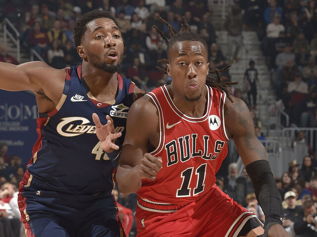 CLEVELAND, OH - NOVEMBER 8: Ayo Dosunmu #11 of the Chicago Bulls drives to the basket as Donovan Mitchell #45 of the Cleveland Cavaliers plays defense during the game on November 8, 2025 at Rocket Arena in Cleveland, Ohio. NOTE TO USER: User expressly acknowledges and agrees that, by downloading and/or using this Photograph, user is consenting to the terms and conditions of the Getty Images License Agreement. Mandatory Copyright Notice: Copyright 2025 NBAE