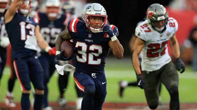 TAMPA, FLORIDA - NOVEMBER 09: Treveyon Henderson #32 of the New England Patriots runs the ball for a touchdown against the Tampa Bay Buccaneers during the second half in the game at Raymond James Stadium on November 09, 2025 in Tampa, Florida.