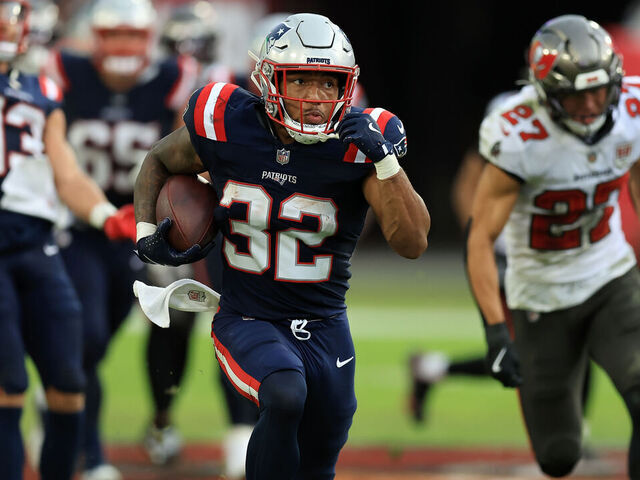 TAMPA, FLORIDA - NOVEMBER 09: Treveyon Henderson #32 of the New England Patriots runs the ball for a touchdown against the Tampa Bay Buccaneers during the second half in the game at Raymond James Stadium on November 09, 2025 in Tampa, Florida.