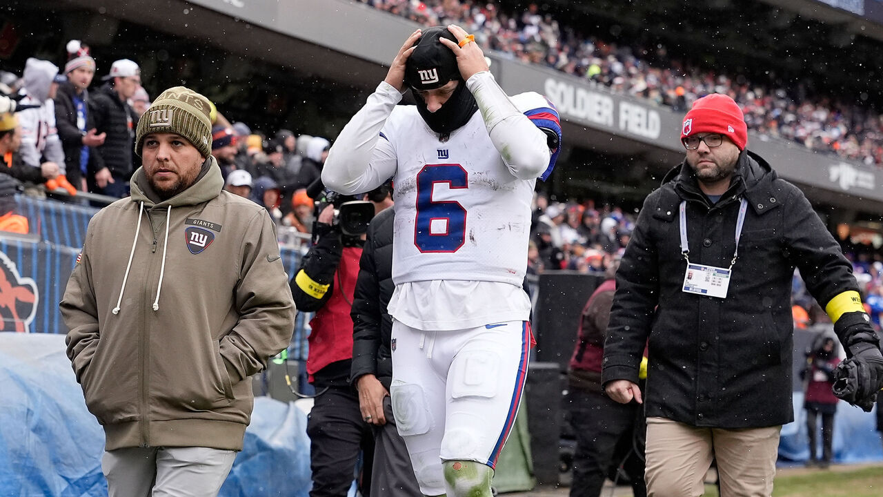 CHICAGO, ILLINOIS - NOVEMBER 09: Jaxson Dart #6 of the New York Giants walks off the field after an injury during the fourth quarter in the game against the Chicago Bears at Soldier Field on November 09, 2025 in Chicago, Illinois.