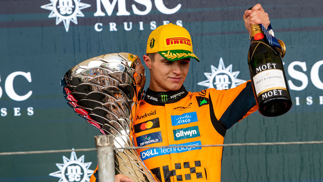 SAO PAULO, BRAZIL - NOVEMBER 9: Lando Norris of Great Britain and McLaren raises his trophy on the podium during the F1 Grand Prix of Brazil at Autodromo Jose Carlos Pace on November 9, 2025 in Sao Paulo, Brazil.