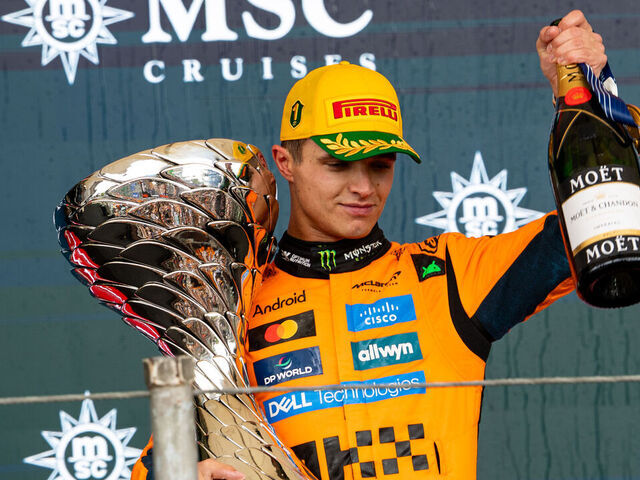SAO PAULO, BRAZIL - NOVEMBER 9: Lando Norris of Great Britain and McLaren raises his trophy on the podium during the F1 Grand Prix of Brazil at Autodromo Jose Carlos Pace on November 9, 2025 in Sao Paulo, Brazil.