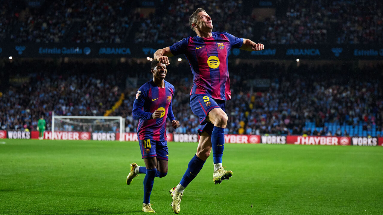 VIGO, SPAIN - NOVEMBER 09: Robert Lewandowski of FC Barcelona celebrates after scores the fourth goal of his team during the LaLiga EA Sports match between RC Celta de Vigo and FC Barcelona at Estadio Abanca-Balaidos on November 09, 2025 in Vigo, Spain.