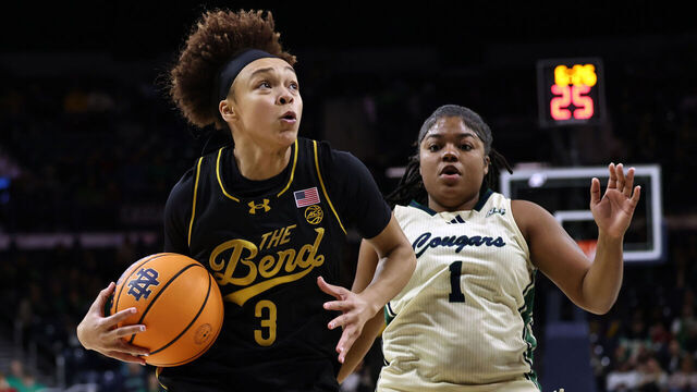 SOUTH BEND, INDIANA - NOVEMBER 9: Hannah Hidalgo #3 of the Notre Dame Fighting Irish dribbles past Aiyanna Culver #1 of the Chicago State Cougars during the first half at Purcell Pavilion at the Joyce Cente on November 9, 2025 in South Bend, Indiana.