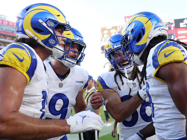 SANTA CLARA, CALIFORNIA - NOVEMBER 09: Matthew Stafford #9 of the Los Angeles Rams and teammates celebrate with Davante Adams #17 of the Los Angeles Rams after a touchdown against the San Francisco 49ers during the third quarter at Levi's Stadium on November 09, 2025 in Santa Clara, California.
