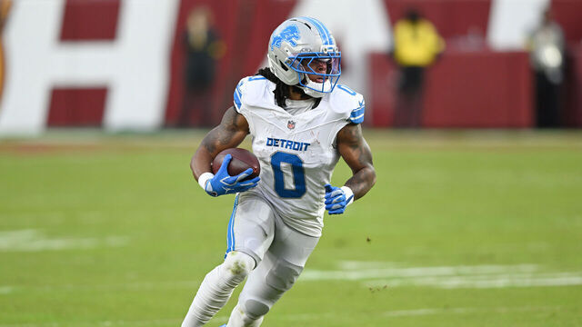LANDOVER, MARYLAND - NOVEMBER 09: Jahmyr Gibbs #0 of the Detroit Lions runs after a catch against the Washington Commanders in the first quarter of a game at Northwest Stadium on November 09, 2025 in Landover, Maryland.
