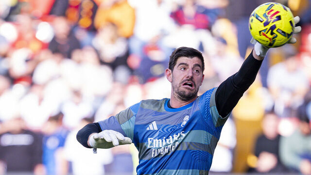 Thibaut Courtois of Real Madrid warms up during the LaLiga EA Sports football match between Rayo Vallecano and Real Madrid at Estadio Vallecas in Madrid, Spain, on November 9, 2025.