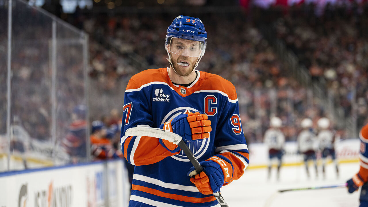 EDMONTON, ALBERTA - NOVEMBER 08: Edmonton Oilers center Connor McDavid (97) cleans his stick during a tv timeout during the second period against the Colorado Avalanche at Rogers Place on November 08, 2025 in Edmonton, Alberta, Canada.