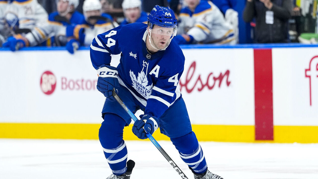 TORONTO, CANADA - OCTOBER 25: Morgan Rielly #44 of the Toronto Maple Leafs skates with the puck against the Buffalo Sabres at the Scotiabank Arena on October 25, 2025 in Toronto, Ontario, Canada.