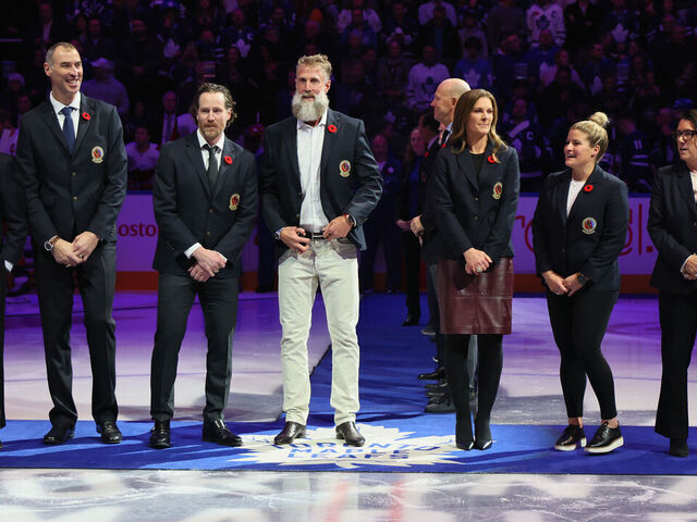 TORONTO, CANADA - NOVEMBER 09: (l-r) Jack Parker, Zdeno Chara, Duncan Keith, Joe Thornton, Jennifer Botterill, Brianna Decker and Daniele Sauvageau take part in a pregame ceremony honoring their upcoming induction into the Hockey Hall of Fame at Scotiabank Arena on November 09, 2025 in Toronto, Ontario, Canada.