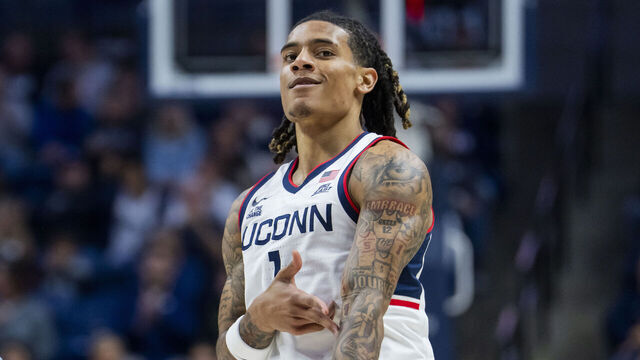STORRS, CONNECTICUT - NOVEMBER 10: Solo Ball #1 of the Connecticut Huskies reacts after scoring against the Columbia Lions during the first half of an NCAA men's basketball game at Harry A. Gampel Pavilion on November 10, 2025 in Storrs, Connecticut.
