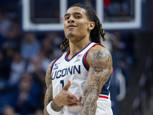 STORRS, CONNECTICUT - NOVEMBER 10: Solo Ball #1 of the Connecticut Huskies reacts after scoring against the Columbia Lions during the first half of an NCAA men's basketball game at Harry A. Gampel Pavilion on November 10, 2025 in Storrs, Connecticut.