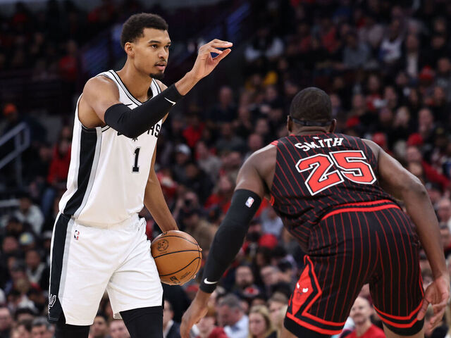 CHICAGO, ILLINOIS - NOVEMBER 10: Victor Wembanyama #1 of the San Antonio Spurs is guarded by Jalen Smith #25 of the Chicago Bulls during the first half at the United Center on November 10, 2025 in Chicago, Illinois.