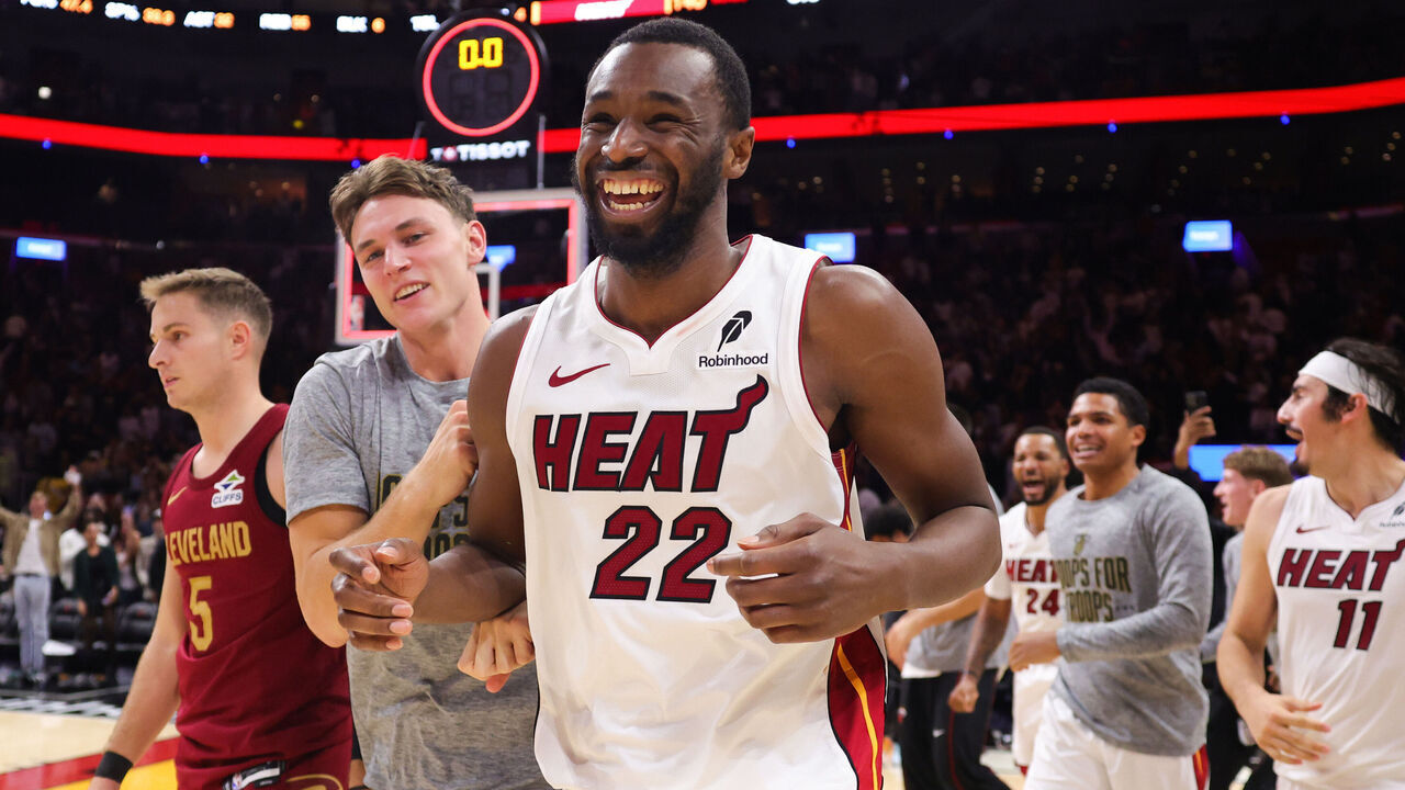 MIAMI, FLORIDA - NOVEMBER 10: Andrew Wiggins #22 of the Miami Heat celebrates with teammates after defeating the Cleveland Cavaliers in overtime at Kaseya Center on November 10, 2025 in Miami, Florida.