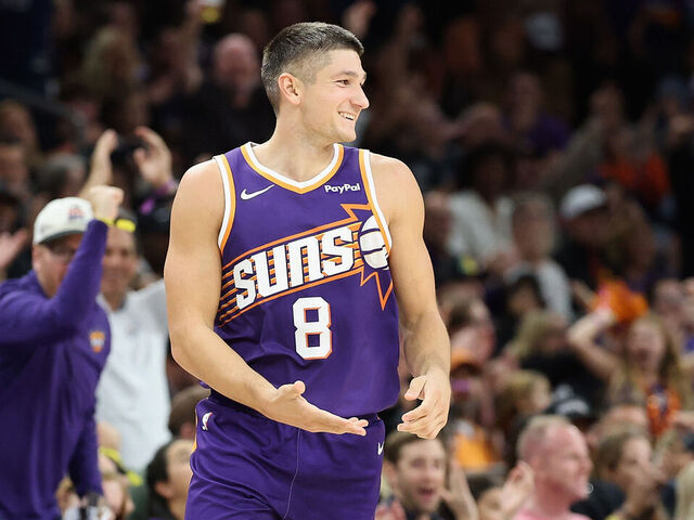 PHOENIX, ARIZONA - NOVEMBER 10: Grayson Allen #8 of the Phoenix Suns reacts after hitting a three-point shot against the New Orleans Pelicans during the second half of the NBA game at Mortgage Matchup Center on November 10, 2025 in Phoenix, Arizona. Allen broke the Phoenix Suns' franchise record for most three-pointers made in a single game with 10.