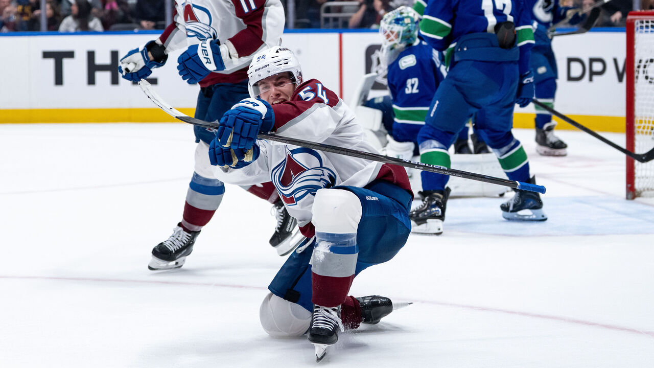 VANCOUVER, BC - NOVEMBER 09: Colorado Avalanche center Gavin Brindley (54) celebrates his goal as center Brock Nelson (11) watches during overtime of an NHL game between the Colorado Avalanche and the Vancouver Canucks on Sunday, November 9, 2025 at Rogers Arena in Vancouver, B.C.