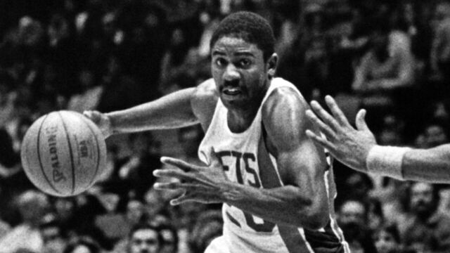 EAST RUTHERFORD, NJ - 1982: Micheal Ray Richardson #20 of the New Jersey Nets drives against the Phoenix Suns during the NBA game circa 1982 at the Brendan Byrne Arena in East Rutherford, New Jersey. Mandatory Copyright Notice: Copyright 1982 NBAE