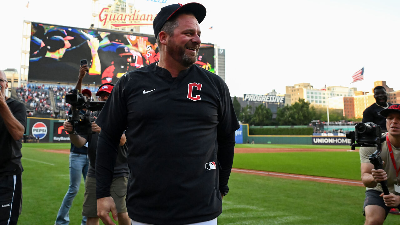 CLEVELAND, OHIO - SEPTEMBER 28: Manager Stephen Vogt #12 of the Cleveland Guardians celebrates the team's 9-8 win over the Texas Rangers in ten innings and clinching the American League Central Division at Progressive Field on September 28, 2025 in Cleveland, Ohio.