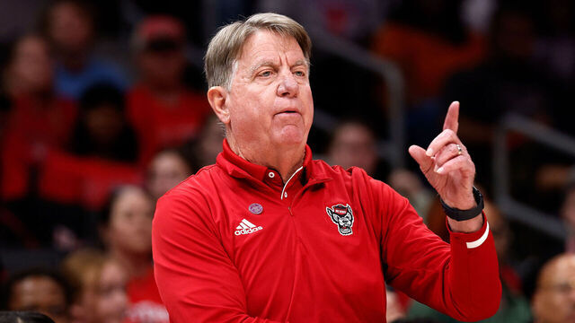CHARLOTTE, NORTH CAROLINA - NOVEMBER 9: Head coach Wes Moore of the NC State Wolfpack directs his team against the USC Trojans in the first half of their 2025 Ally Tipoff game at Spectrum Center on November 9, 2025 in Charlotte, North Carolina.