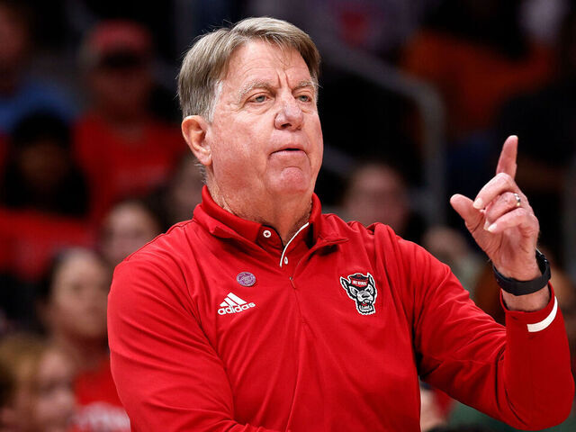 CHARLOTTE, NORTH CAROLINA - NOVEMBER 9: Head coach Wes Moore of the NC State Wolfpack directs his team against the USC Trojans in the first half of their 2025 Ally Tipoff game at Spectrum Center on November 9, 2025 in Charlotte, North Carolina.