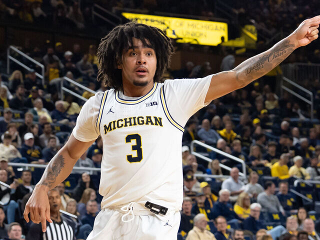 ANN ARBOR, MICHIGAN - NOVEMBER 3: Elliot Cadeau #3 of the Michigan Wolverines reacts during the second half against the Oakland Golden Grizzlies at Crisler Arena on November 3, 2025 in Ann Arbor, Michigan.