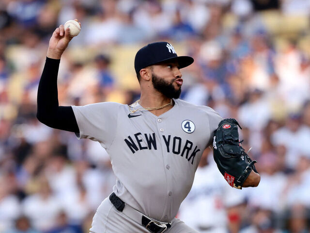 LOS ANGELES, CALIFORNIA - JUNE 01: Devin Williams #38 of the New York Yankees throws a pitch during the eighth inning against the Los Angeles Dodgers at Dodger Stadium on June 01, 2025 in Los Angeles, California.