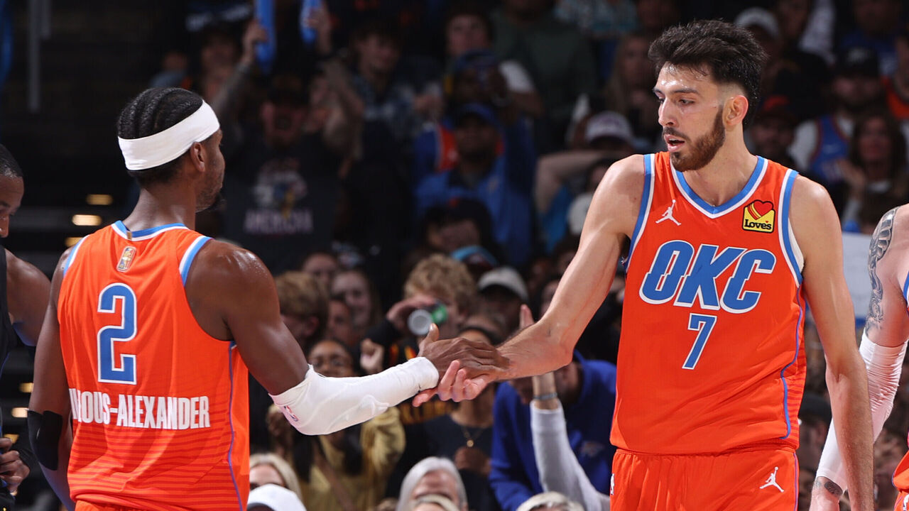 OKLAHOMA CITY, OK - NOVEMBER 11: Shai Gilgeous-Alexander #2 and Chet Holmgren #7 of the Oklahoma City Thunder high five during the game against the Golden State Warriors on November 11, 2025 at Paycom Center in Oklahoma City, Oklahoma. Mandatory Copyright Notice: Copyright 2025 NBAE