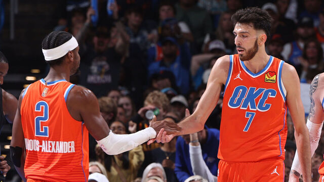 OKLAHOMA CITY, OK - NOVEMBER 11: Shai Gilgeous-Alexander #2 and Chet Holmgren #7 of the Oklahoma City Thunder high five during the game against the Golden State Warriors on November 11, 2025 at Paycom Center in Oklahoma City, Oklahoma. Mandatory Copyright Notice: Copyright 2025 NBAE