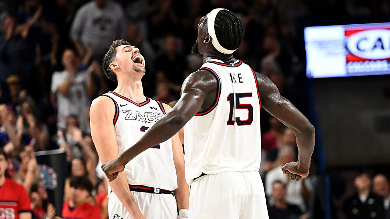 SPOKANE, WASHINGTON - NOVEMBER 11: Steele Venters and forward Graham Ike #15 of the Gonzaga Bulldogs celebrate a shot in the second half against the Creighton Bluejays at McCarthey Athletic Center on November 11, 2025 in Spokane, Washington.