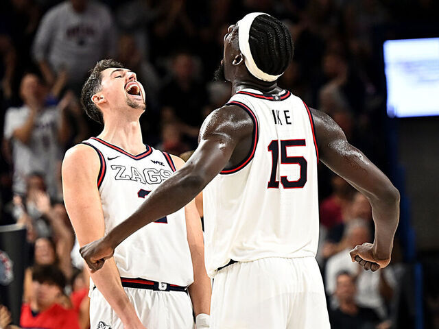 SPOKANE, WASHINGTON - NOVEMBER 11: Steele Venters and forward Graham Ike #15 of the Gonzaga Bulldogs celebrate a shot in the second half against the Creighton Bluejays at McCarthey Athletic Center on November 11, 2025 in Spokane, Washington.