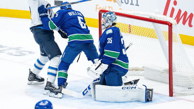 VANCOUVER, BC - NOVEMBER 11: Winnipeg Jets right wing Nino Niederreiter (62) scores on Vancouver Canucks goaltender Thatcher Demko (35) as defenseman Tom Willander (5) defends during the first period of an NHL game between the Winnipeg Jets and the Vancouver Canucks on Tuesday, November 11, 2025 at Rogers Arena in Vancouver, B.C.
