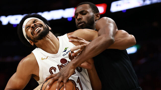 MIAMI, FLORIDA - NOVEMBER 12: Jarrett Allen #31 of the Cleveland Cavaliers battles Andrew Wiggins #22 of the Miami Heat during the second half at Kaseya Center on November 12, 2025 in Miami, Florida.