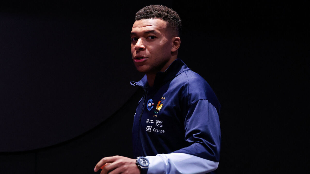 France's forward Kylian Mbappe arrives for a press conference at the Parc des Princes stadium, in Paris, on November 12, 2025 on the eve of the FIFA World Cup 2026 Group D European qualification football match against Ukraine.